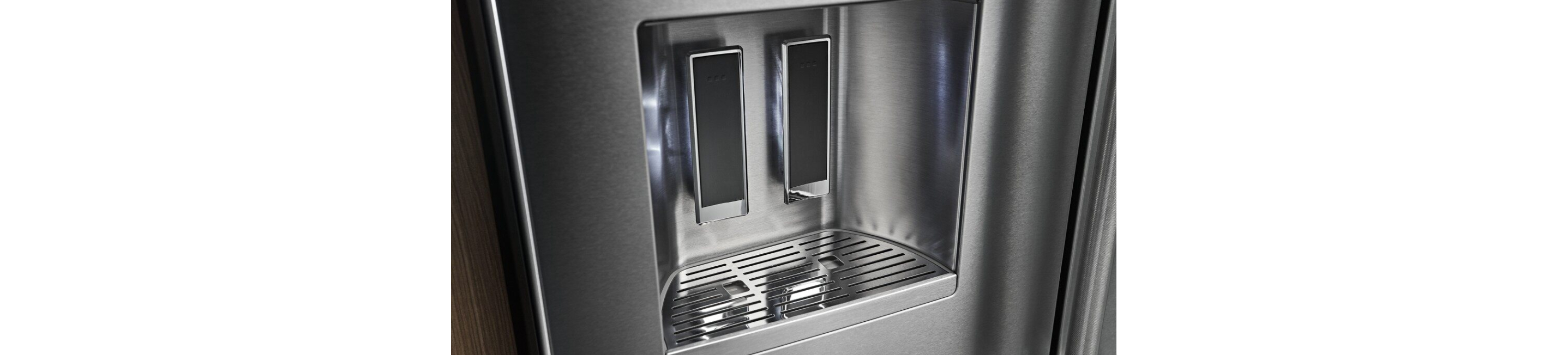External water dispenser illuminated on the KitchenAid® French Door Bottom Mount Refrigerator.