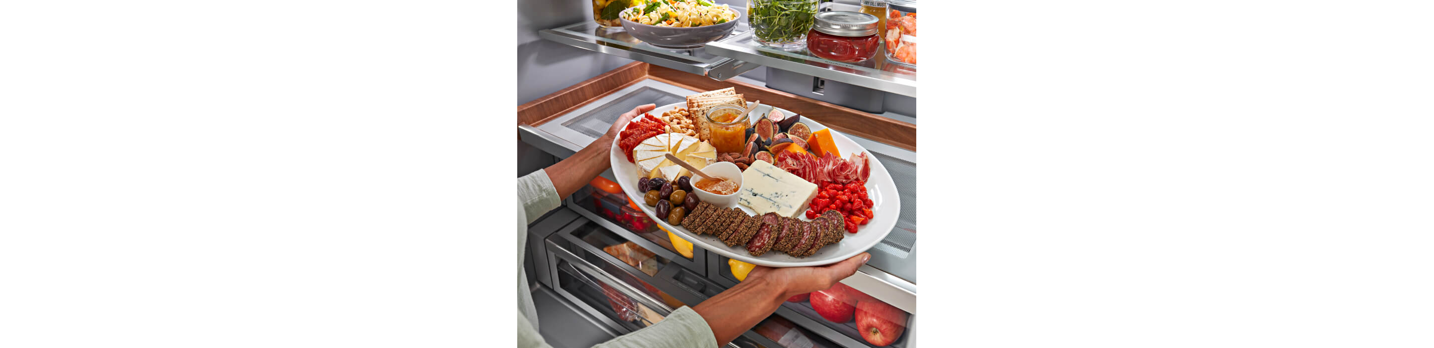 KitchenAid® French Door Bottom Mount Refrigerator Under-Shelf Prep Zone holding charcuterie board.