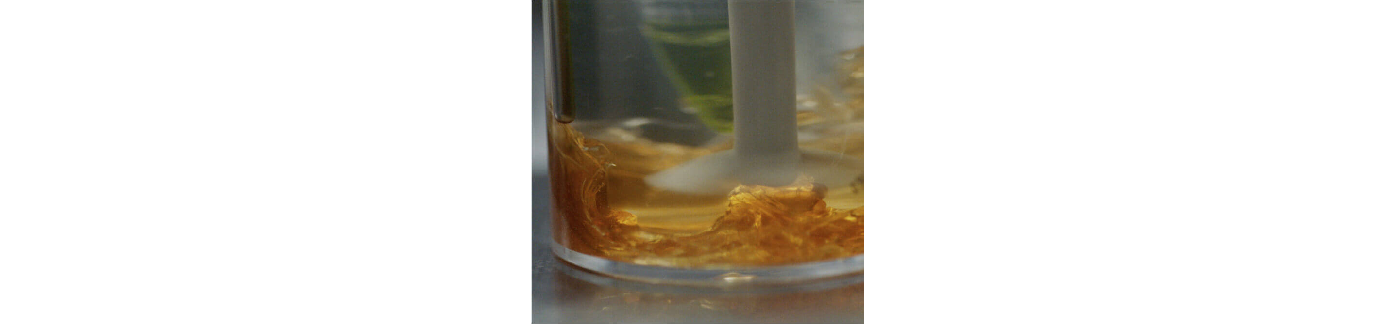 A sample of honey being tested in a lab.