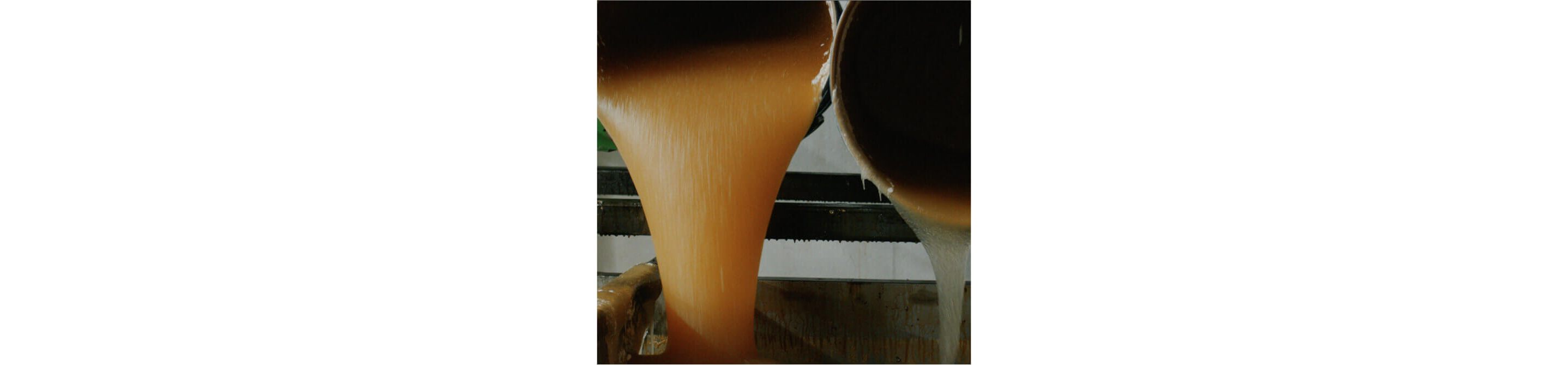 Barrels of honey opened up and poured out.