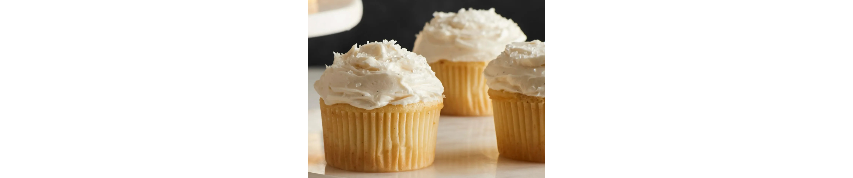 Vanilla cupcakes with vanilla buttercream frosting
