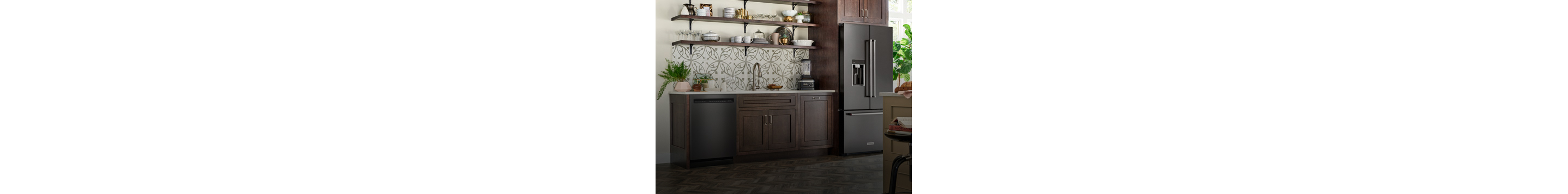 Refrigerator and sink in a kitchen