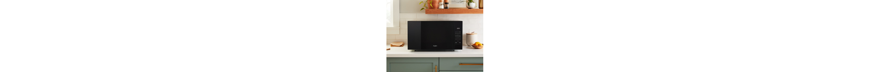 KitchenAid® countertop microwave on a white counter